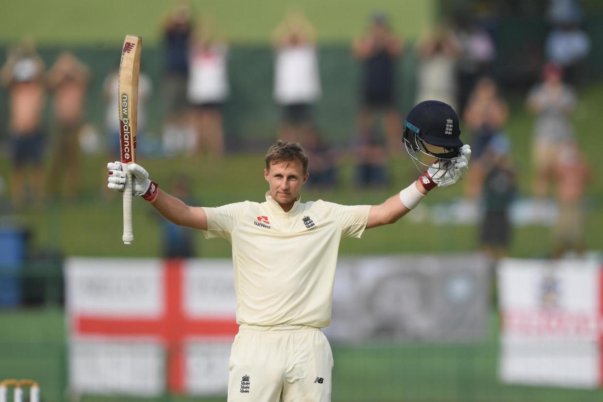 Smashing it: England captain Joe Root celebrates his well-deserved century: Getty Images