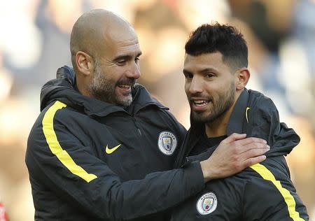 Football Soccer Britain - Burnley v Manchester City - Premier League - Turf Moor - 26/11/16 Manchester City manager Pep Guardiola and Manchester City's Sergio Aguero after the match Reuters / Andrew Yates Livepic