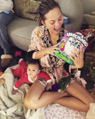 <p>Chrissy Teigen seemed more excited about the Hatchimal little Luna received for Christmas than her baby girl did. “We are all pretending this is for Luna,” the model joked. (Photo: <a rel="nofollow noopener" href="https://www.instagram.com/p/BOcyBCcAEYt/" target="_blank" data-ylk="slk:Instagram;elm:context_link;itc:0" class="link ">Instagram</a>) </p>