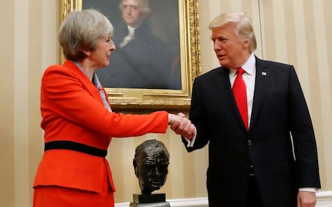 Mrs May was the first foreign leader to visit the US president, in January 2017 - Credit: AP Photo/Pablo Martinez Monsivais