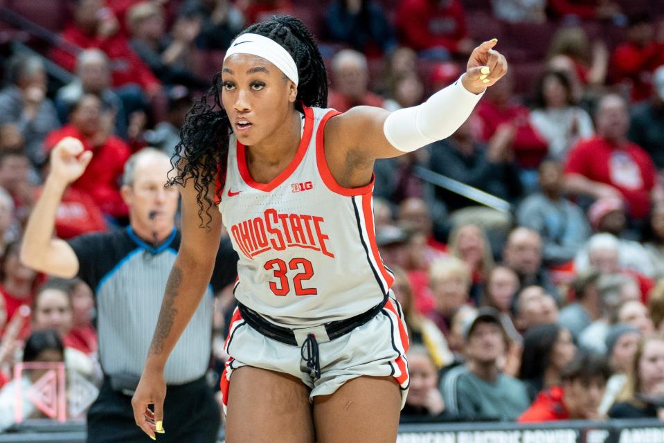 Nov 16, 2023; Columbus, OH, USA;
Ohio State Buckeyes forward Cotie McMahon (32) points towards Jacy Sheldon (4) after she made a three-pointer during their game against the Boston College Eagles on Thursday, Nov. 16, 2023 at Value City Arena.