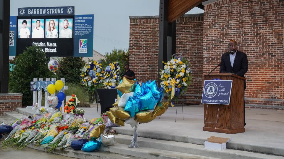 Sen. Raphael Warnock speaks to community members, students, and faculty of Apalachee High School who came together for a vigil on September 6 in Monroe, Georgia. - Megan Varner/Getty Images