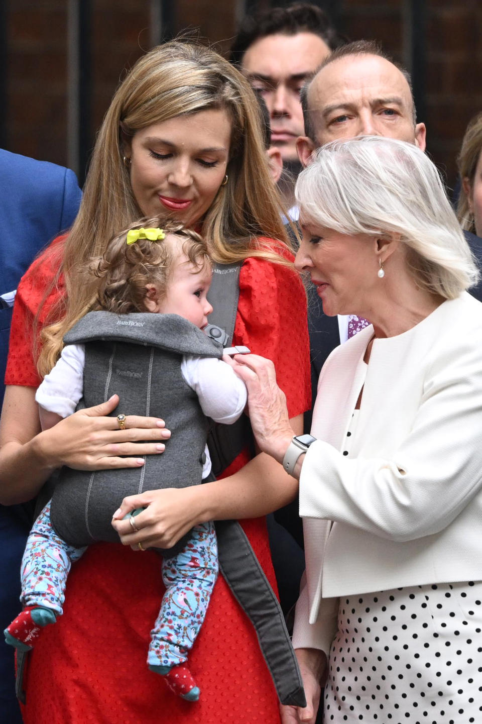 LONDON, ENGLAND - JULY 07: Secretary of State for Digital, Culture, Media and Sport, Nadine Dorries speaks to Carrie Johnson and her daughter Romy outside 10 Downing Street on July 7, 2022 in London, England. After a turbulent term in office, Boris Johnson will resign from his roles as Conservative Party Leader and Prime Minister today after coming under pressure from his party. Eton and Oxford-educated Alexander Boris de Pfeffel Johnson, MP for Uxbridge and South Ruislip, was elected as Prime Minister in the 2019 General Election. (Photo by Leon Neal/Getty Images)