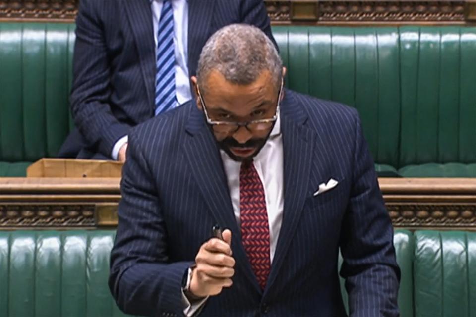 Britain's Home Secretary James Cleverly speaking during a statement on the Government's Plan for Illegal Immigrationm in the House of Commons on Wednesday (PRU/AFP via Getty Images)