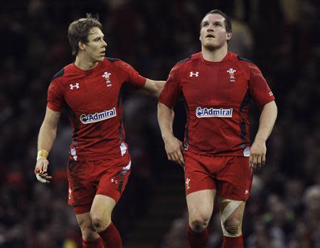 Wales' Liam Williams (L) reacts after scoring a try with team mate Gethin Jenkins during their Six Nations Championship rugby union match against Scotland at the Millennium Stadium, Cardiff, Wales, March 15, 2014. REUTERS/Rebecca Naden