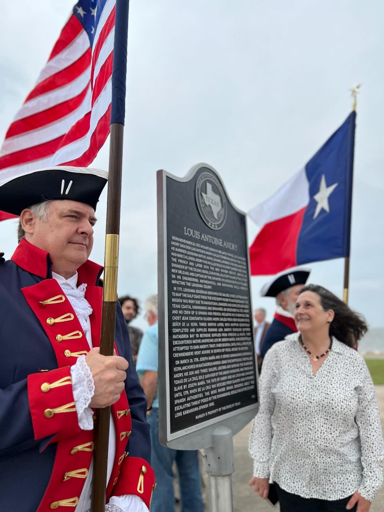 Eileen K. Saling looks admiringly at the Texas Historical Marker that honors her ancestor Louis Antoine Andry. It was dedicated on Feb. 10 at Indianola, Texas. On March 17, his name was added to the Patriot Monument at the Texas State Cemetery by the Daughters of the American Revolution.