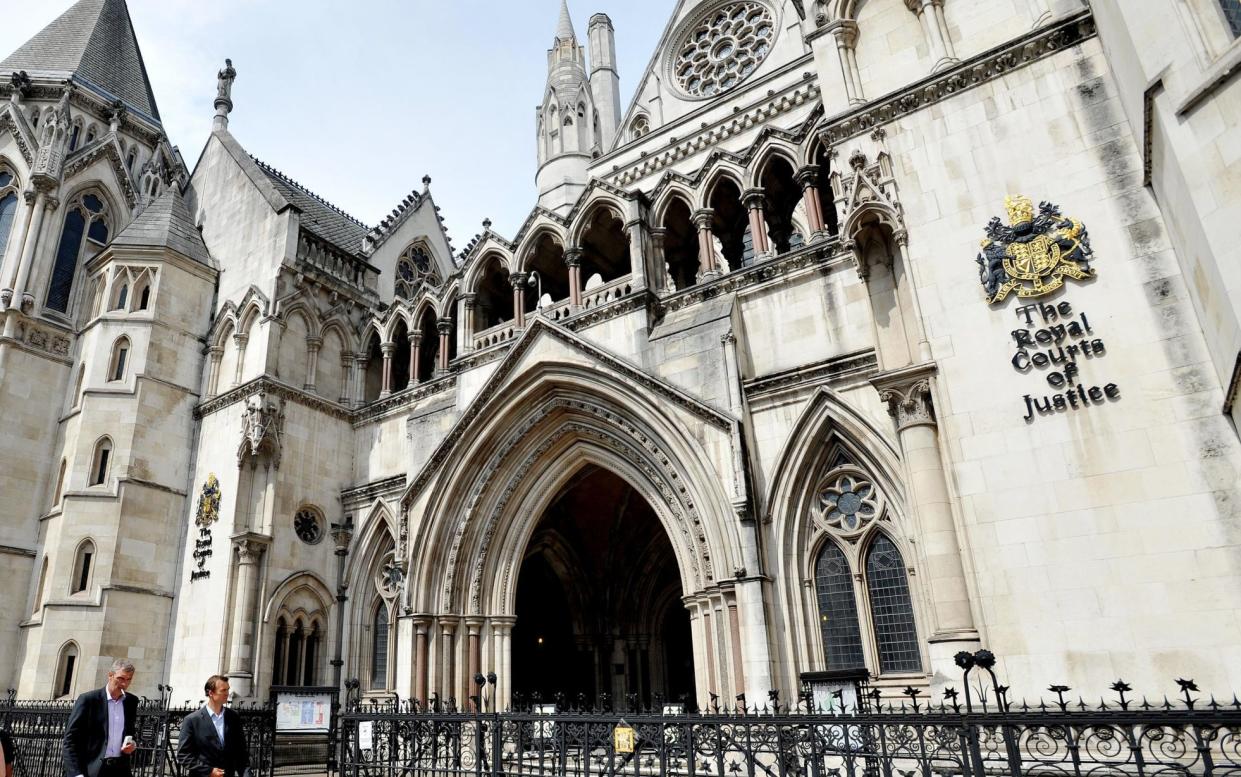 File photo dated 07/08/13 of the Royal Courts of Justice in central London. Prosecutions in England and Wales have fallen to a record low, official statistics show. PRESS ASSOCIATION Photo. Issue date: Thursday February 21, 2019. In the year to September, 1.37 million defendants were proceeded against, a drop of 4% on the previous - Nick Ansell/PA Wire