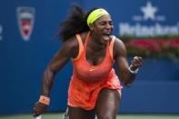 Serena Williams of the U.S. celebrates after defeating Kiki Bertens of the Netherlands during their second round match at the U.S. Open Championship tennis tournament in New York, September 2, 2015. REUTERS/Lucas Jackson