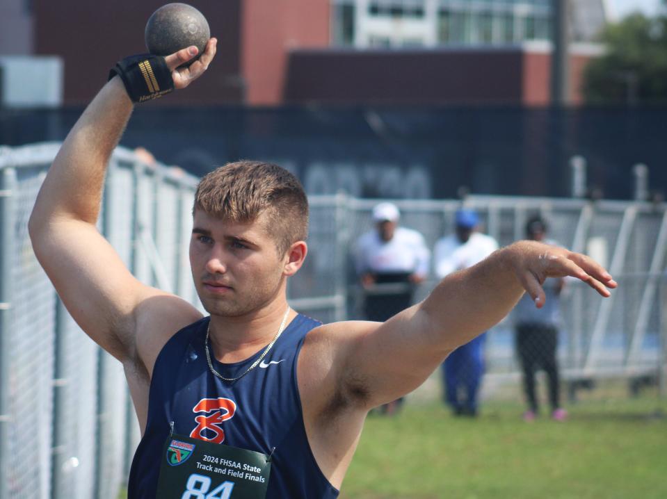 Jackson Hamilton of Palm Beach Gardens Benjamin prepares to throw in the boys shot put during the FHSAA Class 1A high school track and field meet in Jacksonville on May 15, 2024. He won the event. [Clayton Freeman/Florida Times-Union]