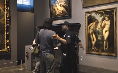 The Tourist Board shot a tongue-in-cheek video of security guards stopping museum visitors with social media accounts from looking at art - Credit:  CEN/Visit Flanders