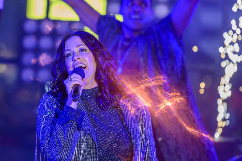Alanis Morissette performs with the cast of the Broadway show "Jagged Little Pill" in New York City's Times Square on December 31, 2019. The singer turns 50 on June 1. File Photo by Corey Sipkin/UPI