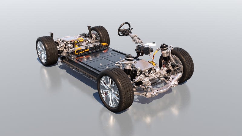 A computer rendering of the electric vehicle platform that will underpin the future Porsche Macan Electric. Visible is the battery making up the floor of the vehicle, plus four wheels and a steering column.