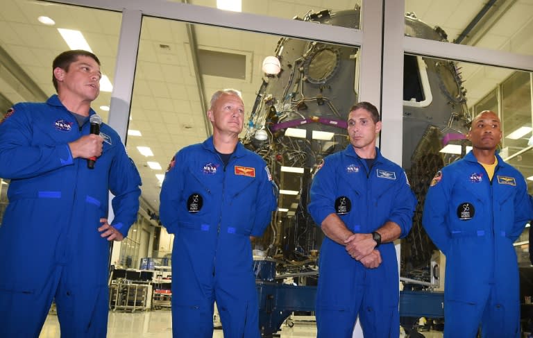 (L-R) Bob Behnken, Doug Hurley, Mike Hopkins and Victor Glover, the NASA astronauts chosen for the Commercial Crew Program to fly on the SpaceX Crew Dragon