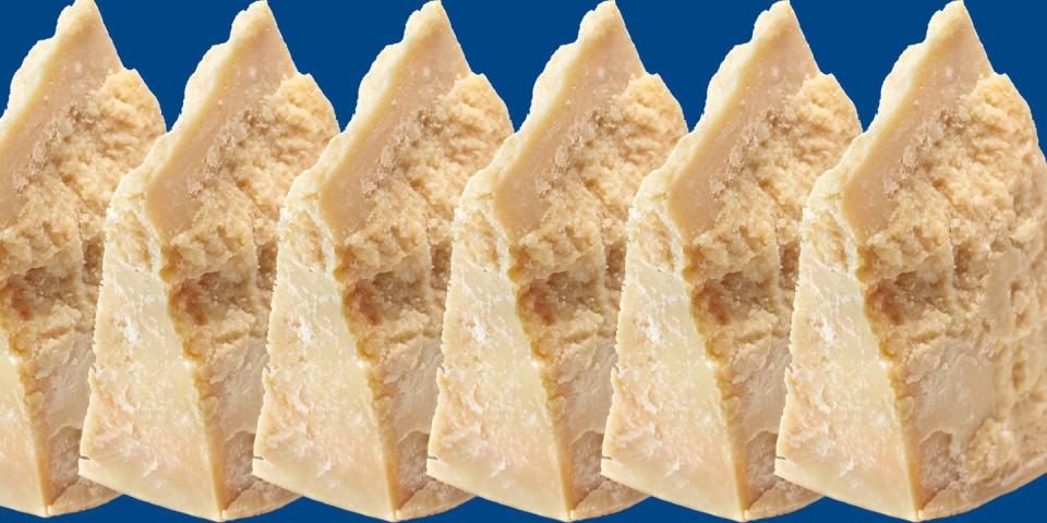 parmigiano reggiano wedges on a blue background