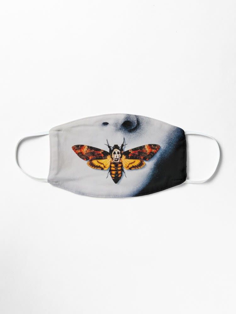 <p>redbubble.com</p><p><strong>$10.00</strong></p><p>Celebrate 30 years of <em>The Silence of the Lambs</em> with this genius face covering inspired by the <a href="https://www.prevention.com/life/g34272741/best-halloween-movies/" rel="nofollow noopener" target="_blank" data-ylk="slk:movie’s;elm:context_link;itc:0;sec:content-canvas" class="link ">movie’s</a> iconic poster. It puts the mask on its face or else it gets the hose again!</p>