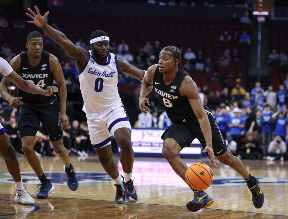 Musketeers guard Quincy Olivari drives past Seton Hall's Dylan Addae-Wusu in the first half of Wednesday night's 88-70 loss to Seton Hall. Olivari had 21 of his game-high 25 points in the second half, finishing 8-of-17 from the field.