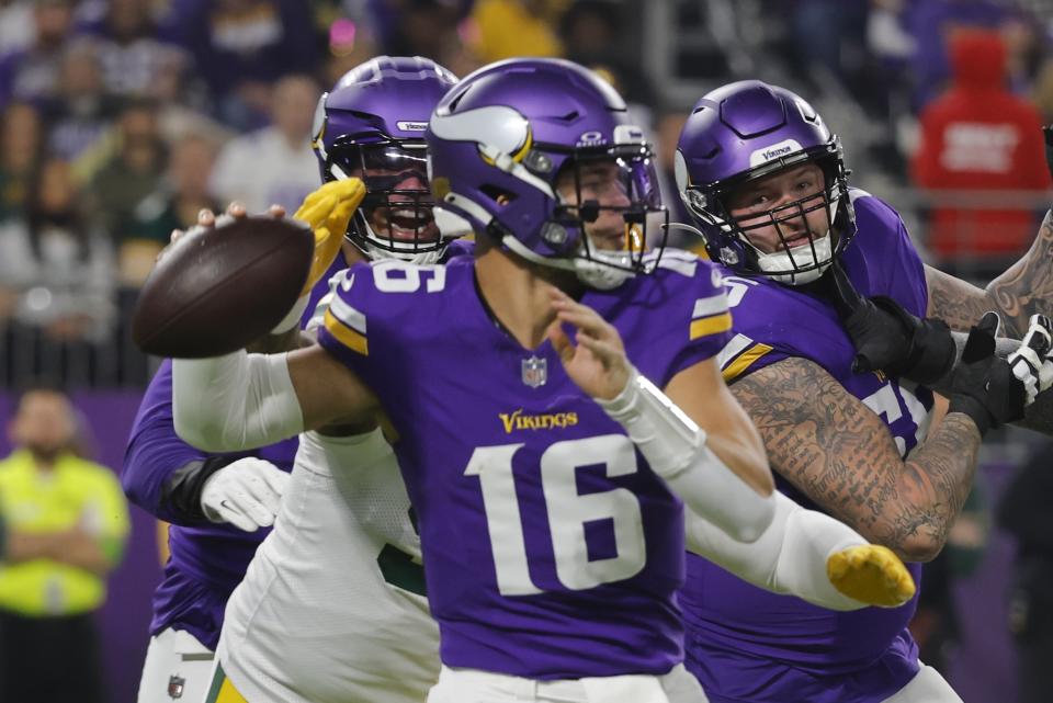 Minnesota Vikings' Jaren Hall throws during the first half of an NFL football game against the Green Bay Packers Sunday, Dec. 31, 2023, in Minneapolis. (AP Photo/Bruce Kluckhohn)