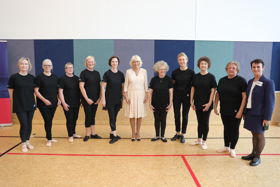 CHRISTCHURCH, NEW ZEALAND - NOVEMBER 22:  Camilla, Duchess of Cornwall poses with the "Silver Swans" dancers as she attends an Active Elderly engagement at the Salvation Army Centre on November 22, 2019 in Christchurch, New Zealand. The Prince of Wales and Duchess of Cornwall are on an 8-day tour of New Zealand. It is their third joint visit to New Zealand and first in four years. (Photo by Chris Jackson/Getty Images)