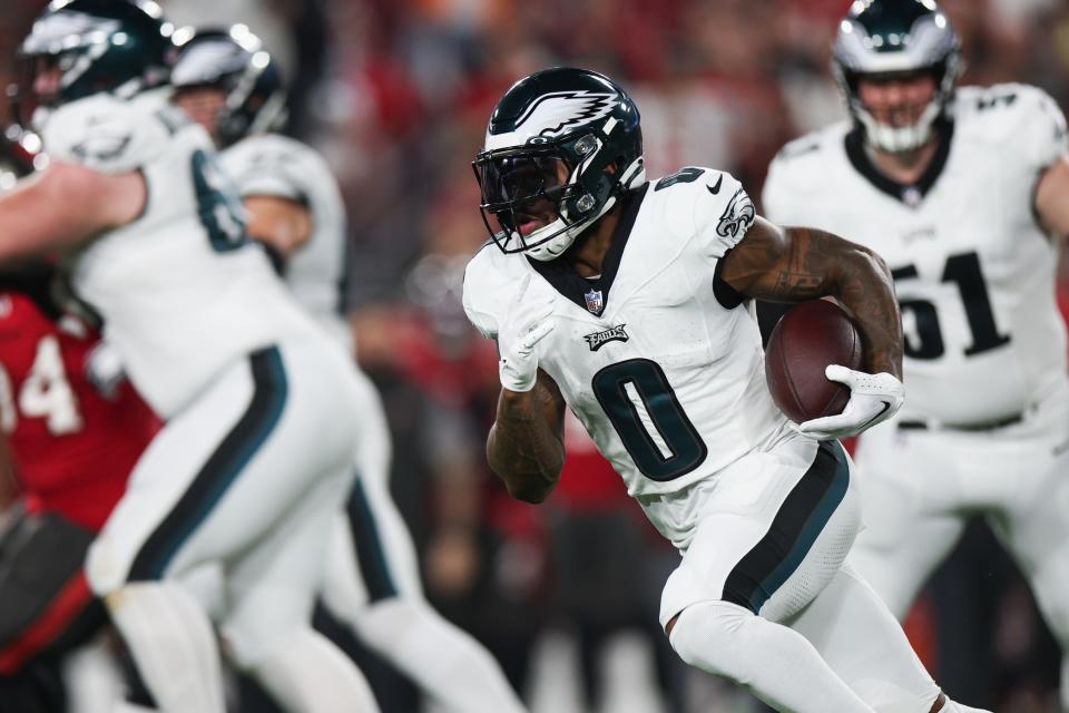 Jan 15, 2024; Tampa, Florida, USA; Philadelphia Eagles running back <a class="link " href="https://sports.yahoo.com/nfl/players/32705" data-i13n="sec:content-canvas;subsec:anchor_text;elm:context_link" data-ylk="slk:D’Andre Swift;sec:content-canvas;subsec:anchor_text;elm:context_link;itc:0">D’Andre Swift</a> (0) runs the ball against the Tampa Bay Buccaneers during the first half of a 2024 NFC wild card game at Raymond James Stadium. Mandatory Credit: Nathan Ray Seebeck-USA TODAY Sports