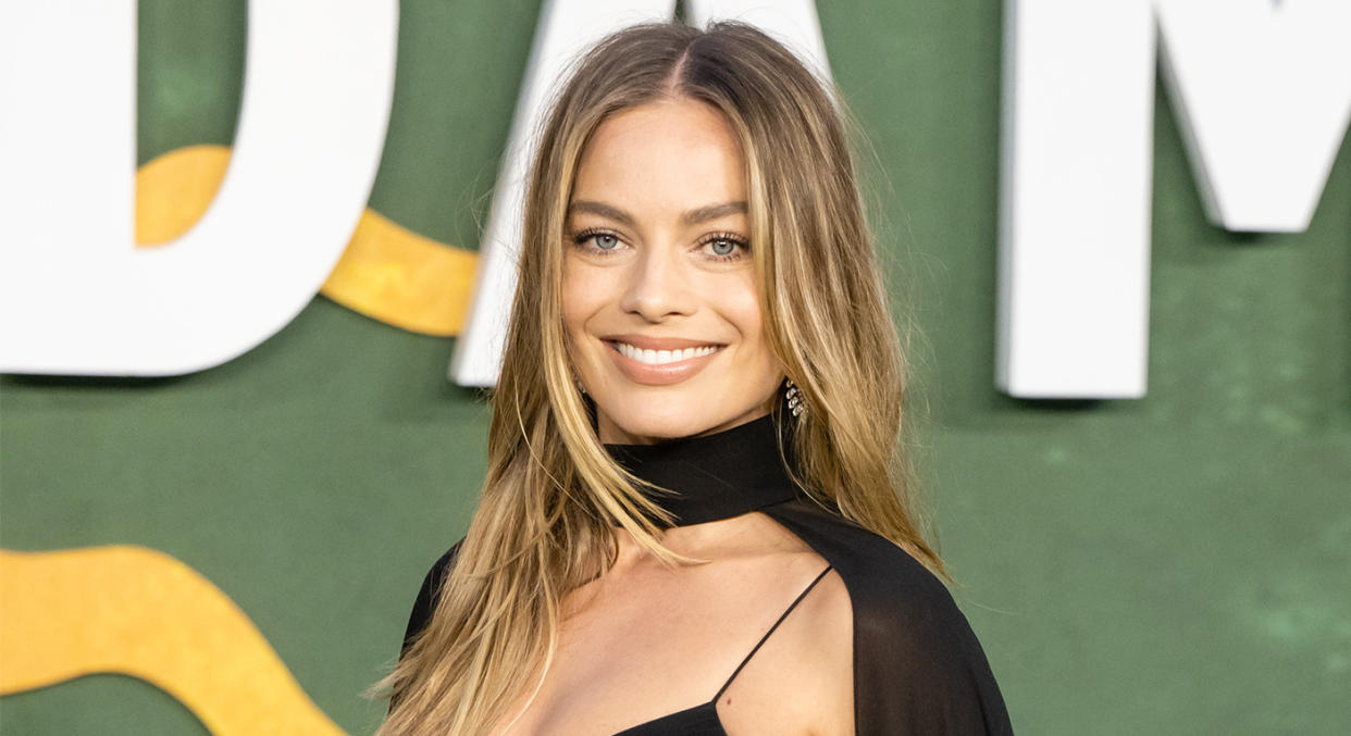 Margot Robbie stunned in an all-black Celine outfit on the Amsterdam red carpet on Wednesday. (Getty Images)