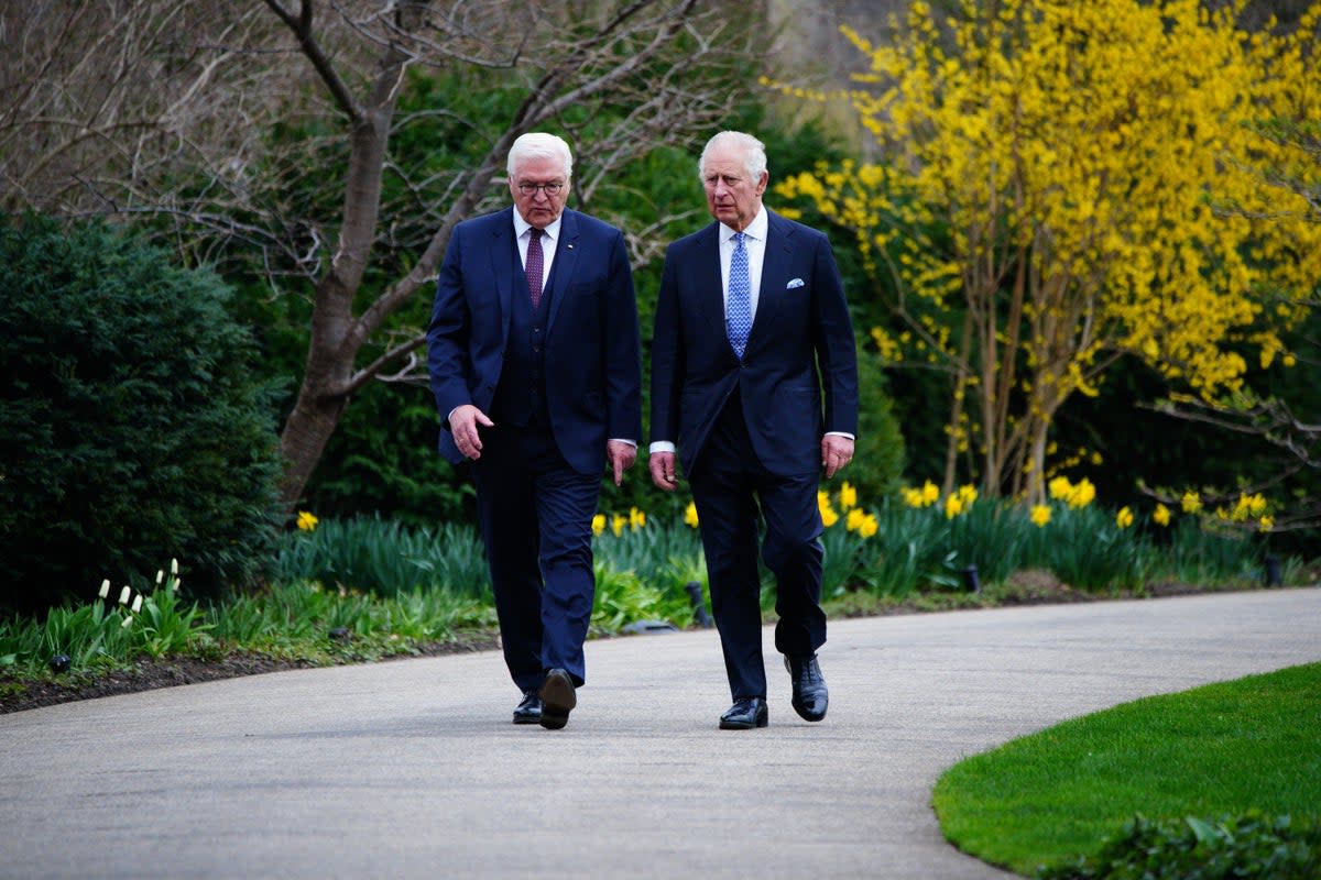 The King and German President Frank-Walter Steinmeier after planting a tree after attending a Green Energy reception at Bellevue Palace, Berlin, the official residence of the President of Germany (Ben Birchall/PA) (PA Wire)