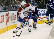 Oct 7, 2015; Toronto, Ontario, CAN; Montreal Canadiens forward Devante Smith-Pelly (21) carries the puck against the Toronto Maple Leafs at the Air Canada Centre. John E. Sokolowski-USA TODAY Sports