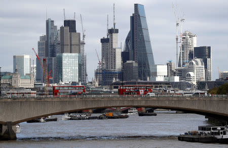 Buildings in the City of London are seen behind Waterloo Bridge in London, Britain October 20, 2017. Picture taken October 20, 2017. REUTERS/Peter Nicholls