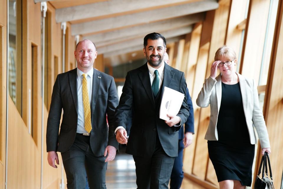 Humza Yousaf, with Neil Gray and Shona Robison (PA Wire)