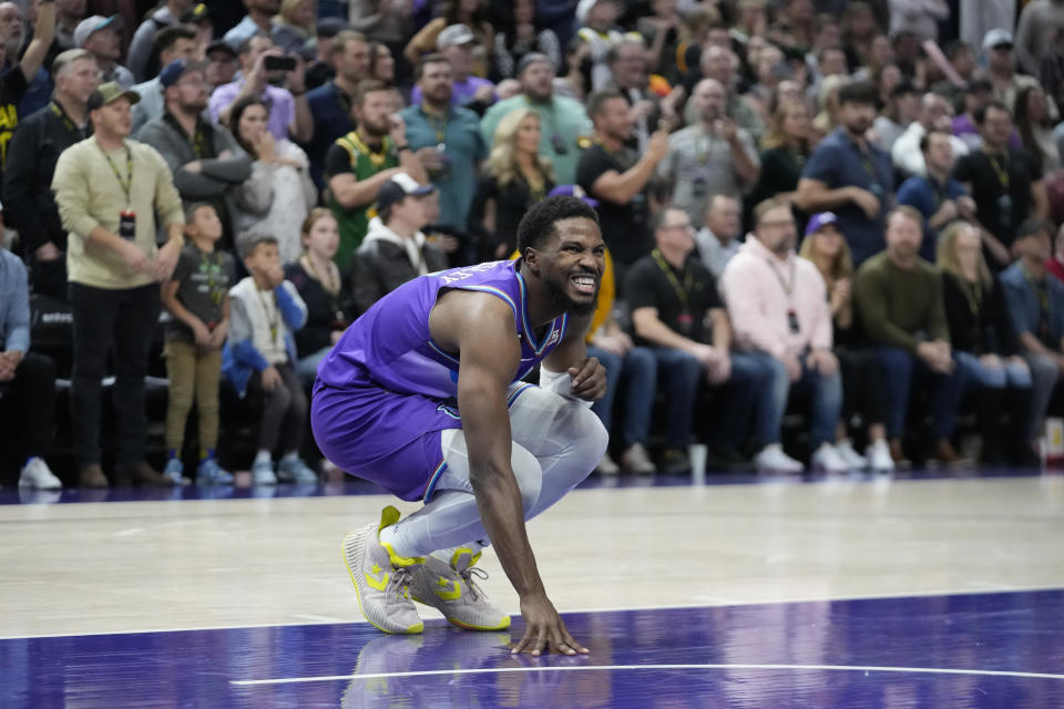 Utah Jazz guard Malik Beasley celebrates after the Jazz scored against the Phoenix Suns during the second half of an NBA basketball game Friday, Nov. 18, 2022, in Salt Lake City. (AP Photo/Rick Bowmer)