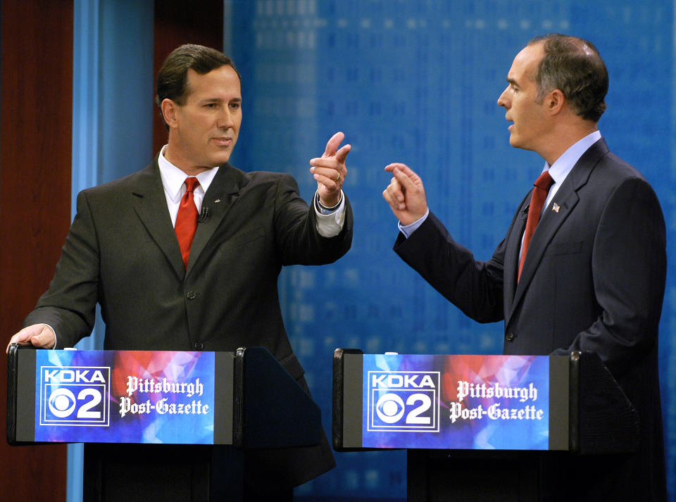 FILE - In this Oct. 12, 2006 file photo, then-Sen. Rick Santorum, R-Pa., left, and his opponent Democrat Bob Casey confront each other during the taping of a debate at the KDKA television studio in Pittsburgh. Rick Santorum boasts that deep conservative values make him a stronger challenger against President Barack Obama this fall than likely GOP nominee Mitt Romney. (AP Photo/Steve Mellon, File)