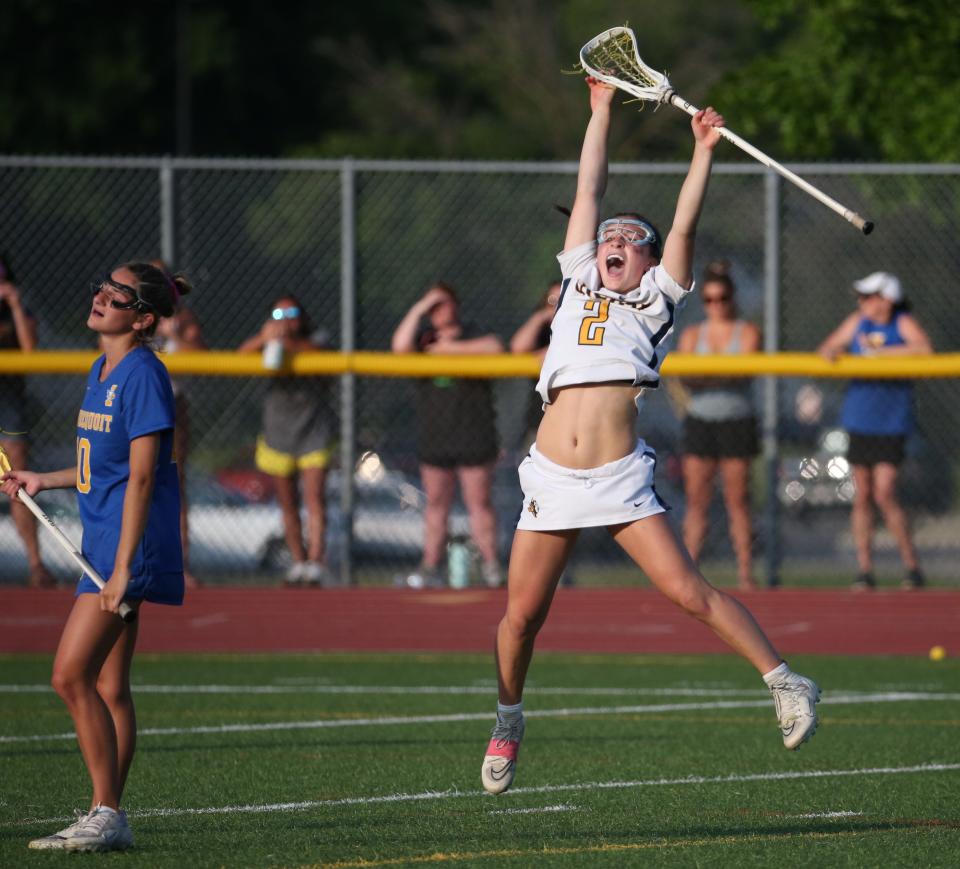 Victor's Allie Pisano leaps in celebration as she scores with seconds left in the fourth overtime to beat Irondequoit in their Section V Class B Finals game Wednesday, May 31, 2023 at East Rochester High School.  Victor won the final 8-7 in four overtimes.