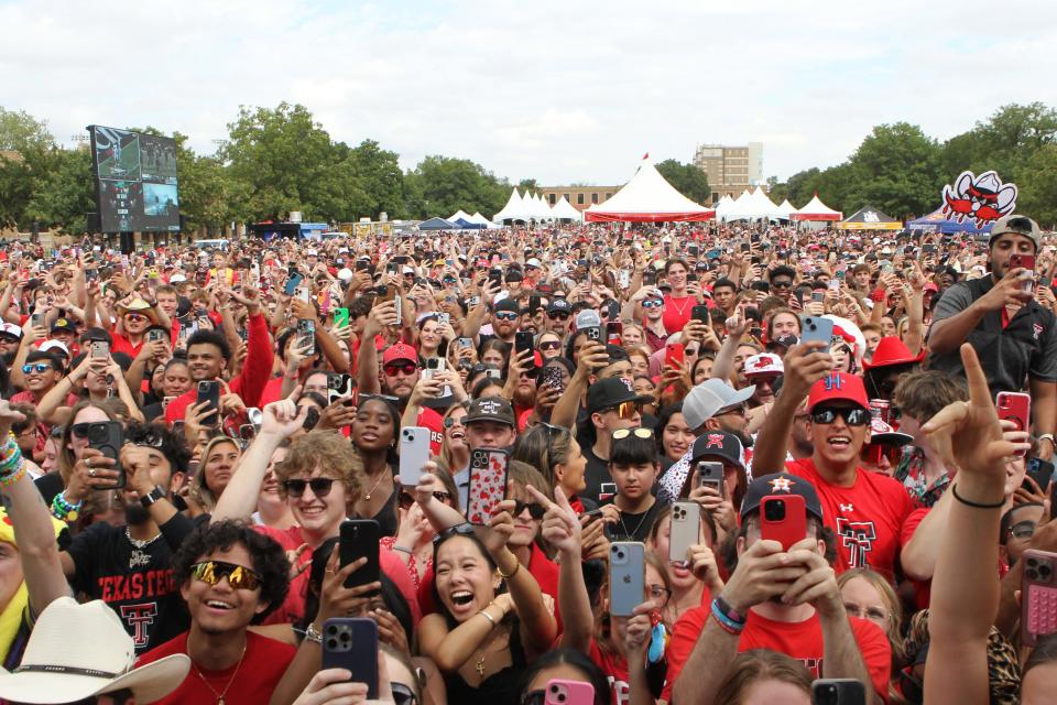 Sep 21, 2024; Lubbock, Texas, USA; Texas Tech Red Raiders fans in Raider Alley during a concert by NBA former player Shaquille O'Neal before a game between the Texas Tech Red Raiders and the Arizona State Sun Devils at Jones AT&T Stadium and Cody Campbell Field.