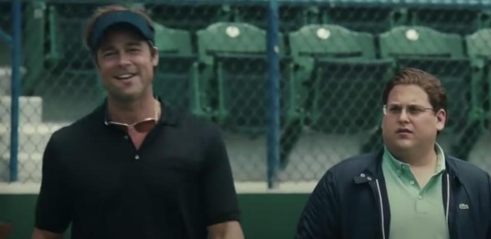 Billy Beane and Peter Brand at a baseball stadium