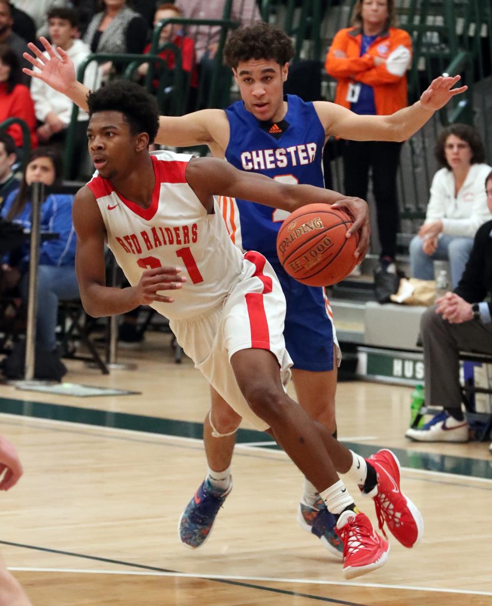Hamilton's Jaylen Savage cuts away from Chester's Noah Angeles during their NYSPHSAA sub-regional game at Yorktown High School March 4, 2022. Hamilton won 76-51.