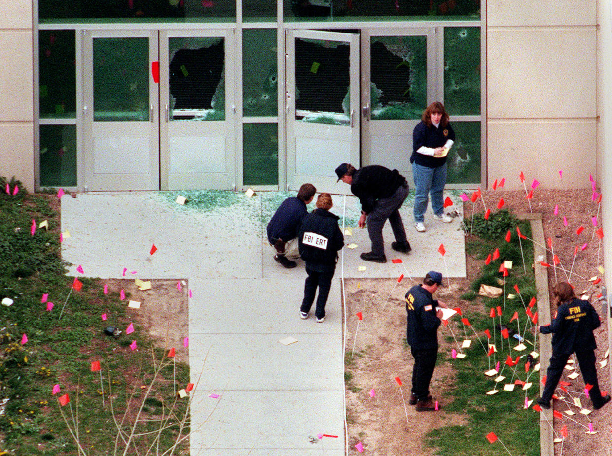 Investigators tag evidence at Columbine High School. (Photo: Dennis Schroeder/Polaris)