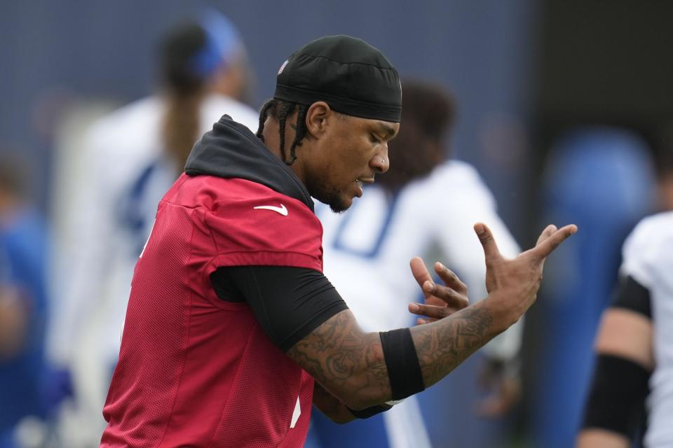 Indianapolis Colts quarterback Anthony Richardson warms-up during NFL football practice at the team's headquarters Wednesday, June 5, 2024, in Indianapolis. (AP Photo/Darron Cummings)