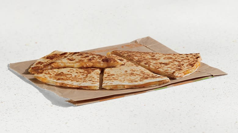 Cheese Quesadilla on brown paper bag