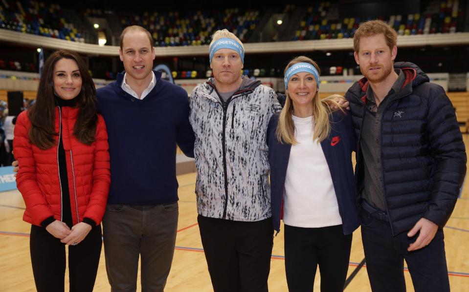 Britain's Kate, the Duchess of Cambridge,Prince William, athlete Iwan Thomas, athlete Paula Radcliffe and Prince Harry from left, pose for a photograph at the Copper Box during a training event to promote the charity Heads Together, at the Queen Elizabeth II Park in London, Sunday, Feb. 5, 2017. (AP Photo/Alastair Grant, Pool)