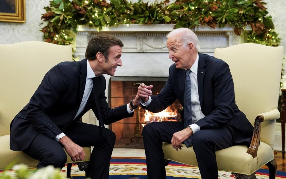 Emmanuel Macron was speaking in the US where he is visiting Joe Biden - REUTERS