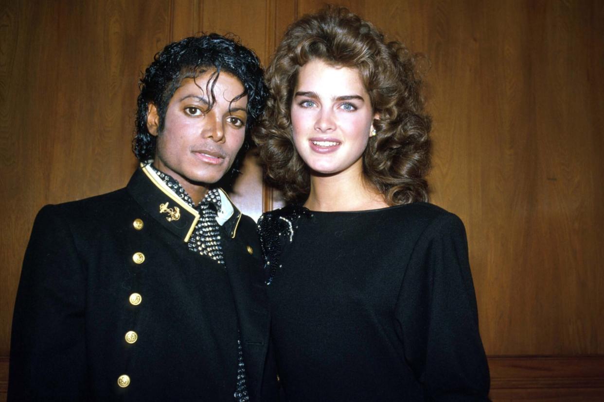 382800 04: Singer Michael Jackson poses with friend and actress Brooke Shields February 7, 1984 in the USA. Jackson is recuperating from severe scalp burns suffered when his hair was ignited by pyrotechnic special effects while filming a Pepsi Cola TV commercial the last week in January. (Photo by Yvonne Hemsey/Liaison)