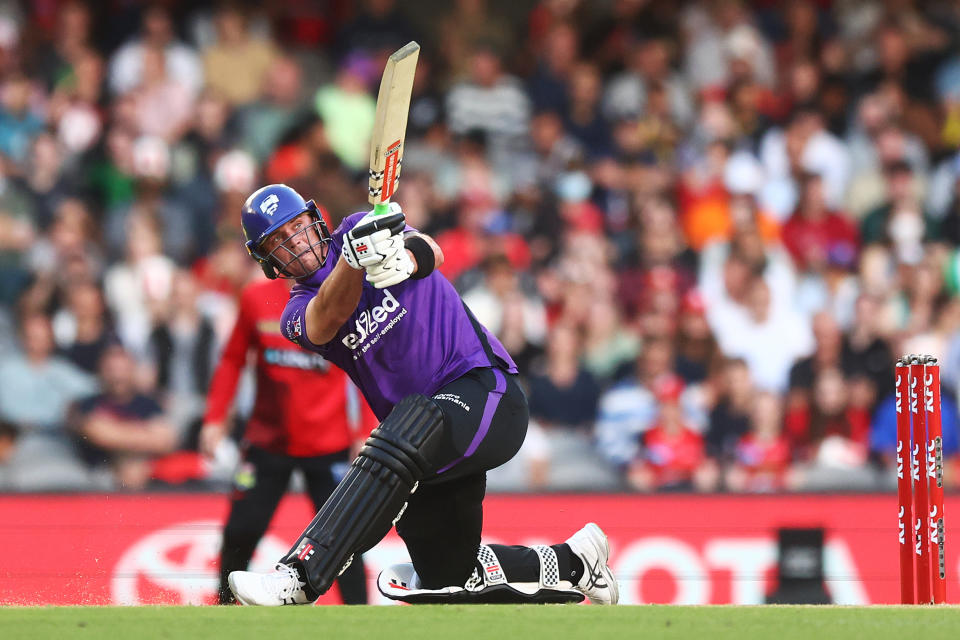 Seen here, Hobart batter Ben McDermott hits a shot towards the boundary against the Melbourne Renegades.