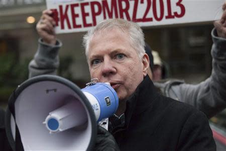 City of Seattle Mayor-elect Ed Murray, who is gay, addresses a crowd of students during a rally in support of Eastside Catholic High School's former Vice Principal Mark Zmuda at the Archdiocese of Seattle chancery building in Seattle, Washington, December 20, 2013. REUTERS/David Ryder