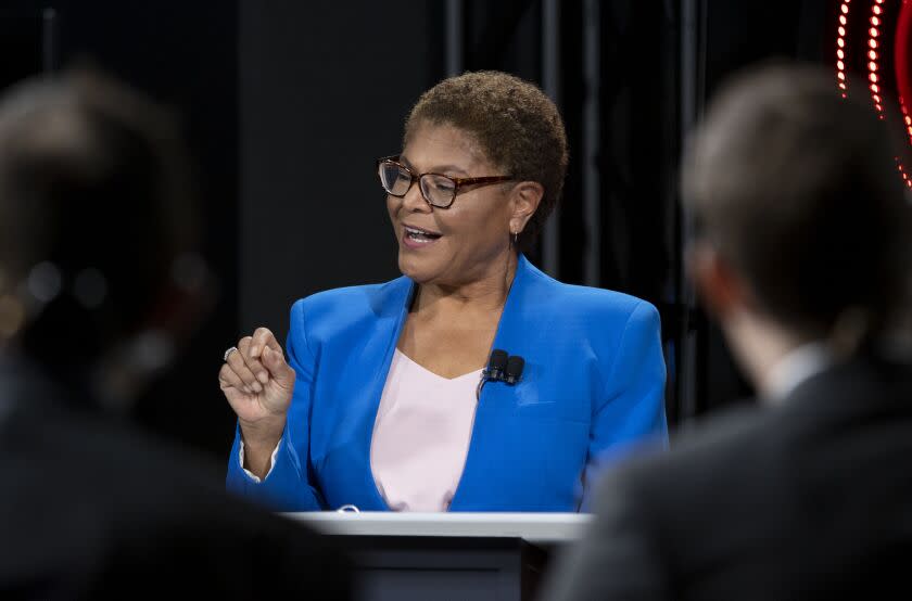 Los Angeles, CA - October 06: Los Angeles Mayoral candidate builder Rick Caruso, not pictured, listens to Congresswoman Karen Bass speak as they participate in the second one-on-one mayoral debate at the KNX Newsradio SoundSpace Stage in Los Angeles, Thursday, Oct. 6, 2022. (Allen J. Schaben / Los Angeles Times)