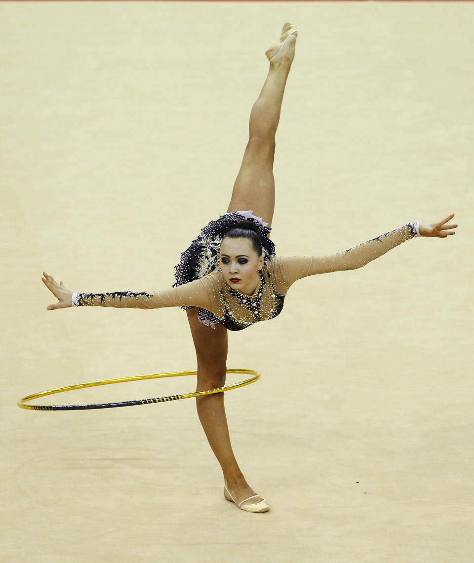 LONDON, ENGLAND - JANUARY 16: Anna Alyabyeva of Kazakhstan in action in the Individual All-Around during the FIG Rhythmic Gymnastics Olympic Qualification round at North Greenwich Arena on January 16, 2012 in London, England. (Photo by Ian Walton/Getty Images)