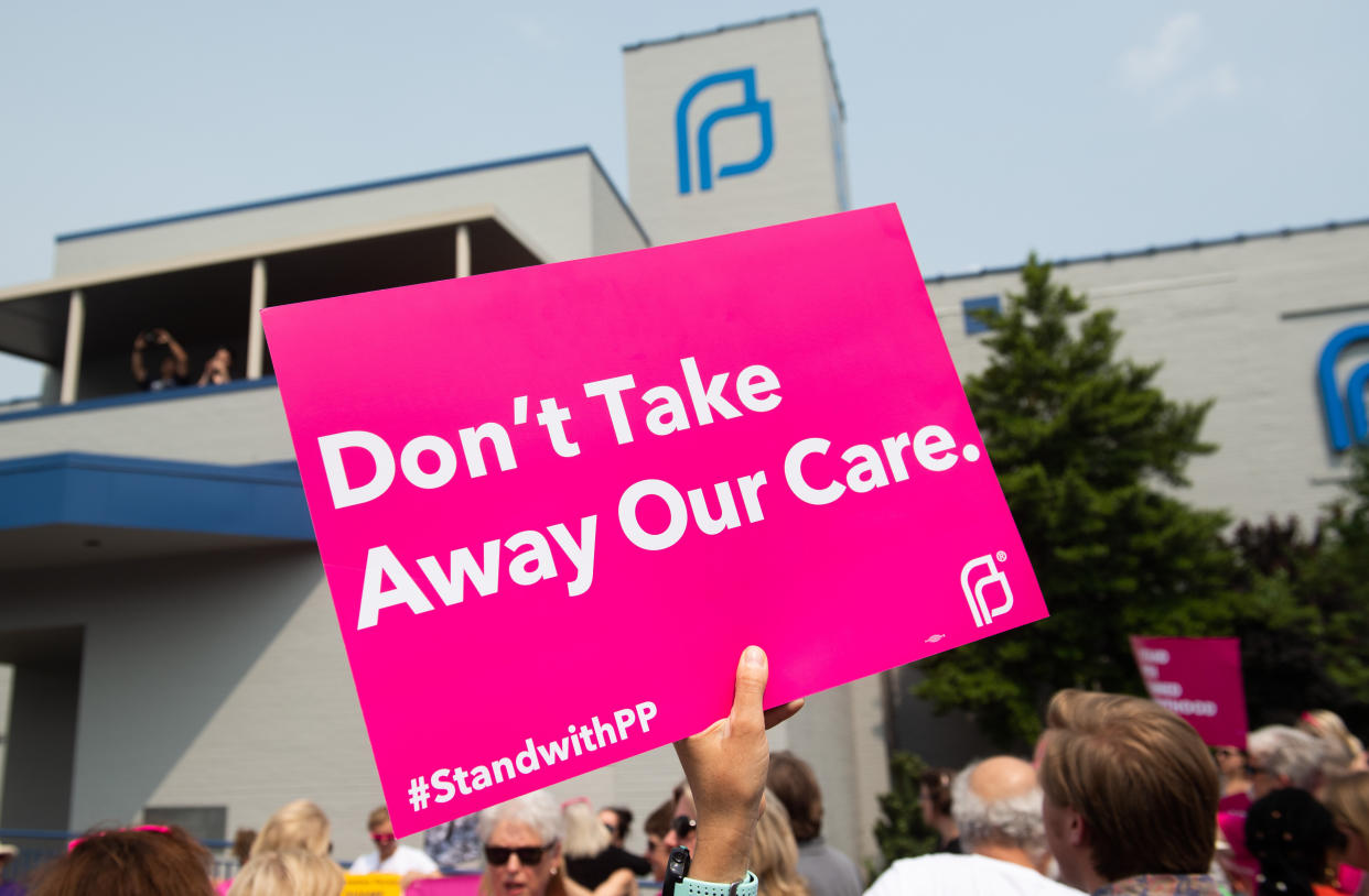 Pro-choice supporters and staff of Planned Parenthood hold a rally outside the Planned Parenthood Reproductive Health Services Center in St. Louis, Missouri, May 31, 2019, the last location in the state performing abortions, after a US Court announced the clinic could continue operating. - A US Court on May 31, 2019 blocked Missouri from closing the clinic. (Photo by SAUL LOEB / AFP)        (Photo credit should read SAUL LOEB/AFP/Getty Images)