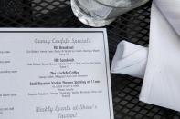 <p>epa06017190 A menu showing items being served as people watch Former FBI Director James Comey testimony before the Senate Intelligence Committee on Capitol Hill at Shaw’s Bar in Washington, D.C., June 8, 2017. Several hundred people lined up very early this morning to get a seat to watch the testimony and enjoy refreshments such as ‘FBI Breakfast’ and ‘The Covfefe Coffee’. (Tasos Katopodis/EPA) </p>