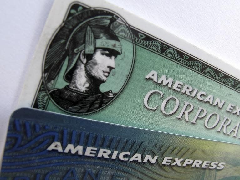 American Express and American Express corporate cards are pictured in Encinitas, California October 17, 2011.  REUTERS/Mike Blake    