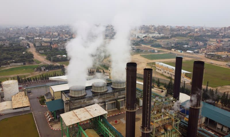 A picture taken with a drone shows steam rising from Gaza's lone power plant, in the central Gaza Strip