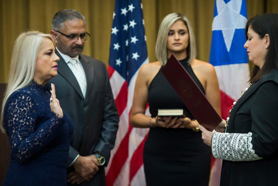 Justice Secretary Wanda Vazquez is sworn in as governor of Puerto Rico by Supreme Court Justice Maite Oronoz, in San Juan, Puerto Rico on Aug. 7, 2019.
