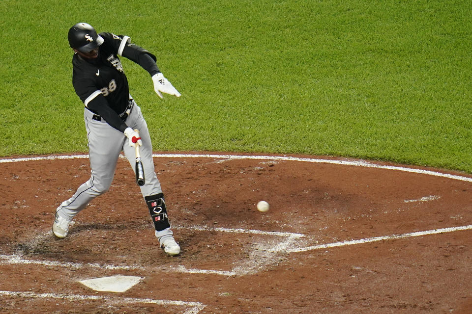 Chicago White Sox's Luis Robert grounds out into a double play against the Baltimore Orioles during the third inning of a baseball game, Thursday, Aug. 25, 2022, in Baltimore. (AP Photo/Julio Cortez)